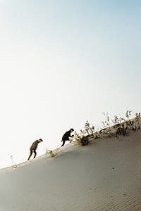 two man climbing on mountain thumbnail