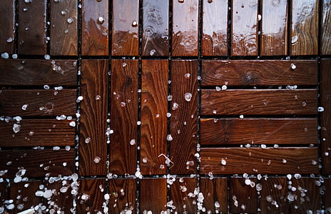 photo of white grains on brown wooden surface thumbnail