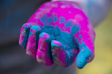 left hand with cyan and pink powder thumbnail