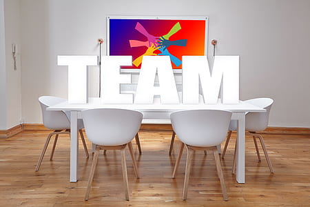 TEAM free standing letter on white wooden table taken on lighted room thumbnail