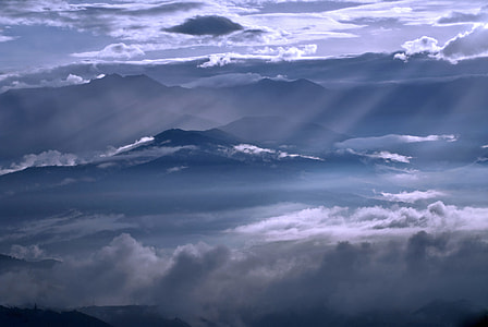 mountain covered clouds during daytime thumbnail