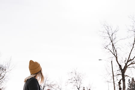 woman looking at an empty sky during day tinme thumbnail