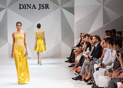 woman wearing yellow tube dress on model runway thumbnail