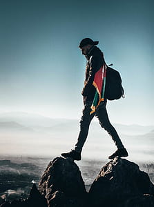 Man Standing On Rocks thumbnail