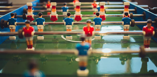 close-up photo of green and blue foosball table thumbnail