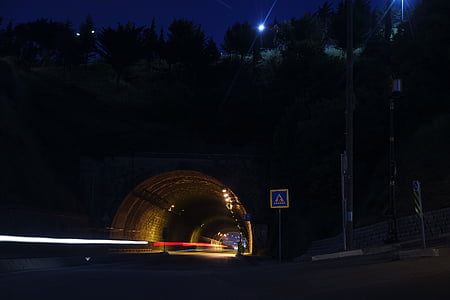 time lapse photography of cars passing on road thumbnail