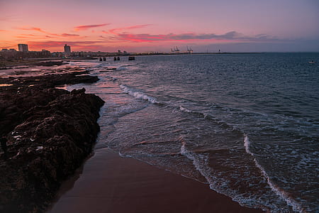 scenery of beach with rocks thumbnail