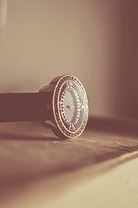 round gold-colored analog watch thumbnail