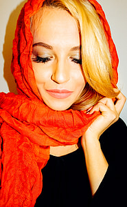 closeup photo of woman wearing red headscarf thumbnail