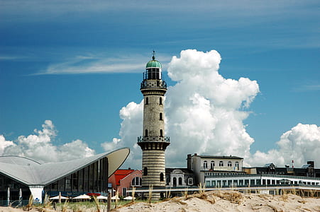 lighthouse during daytime thumbnail