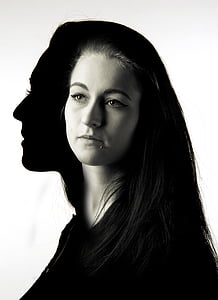 grayscale photo of woman with her shadow thumbnail