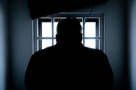 man front of window thumbnail