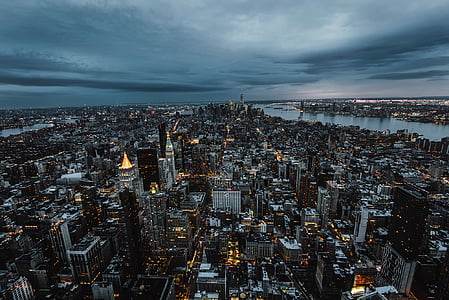aerial photography of city under white sky during night time thumbnail