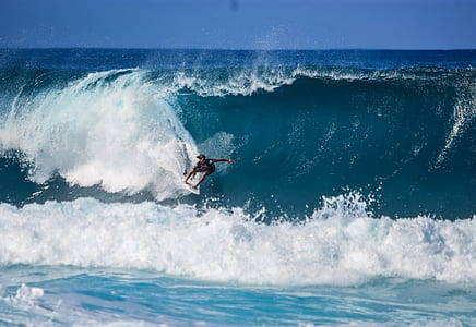 man doing surfing on sea waves thumbnail