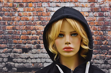 female mannequin wearing black hoodie thumbnail