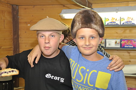 two boys wearing hat and shirt thumbnail