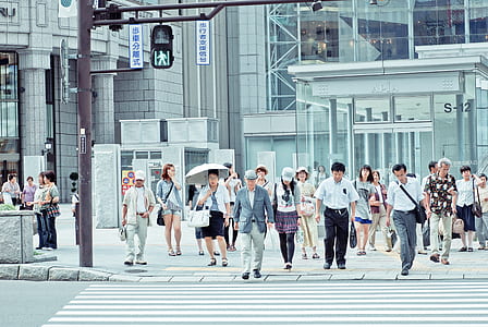 people crossing pedestrian lane thumbnail