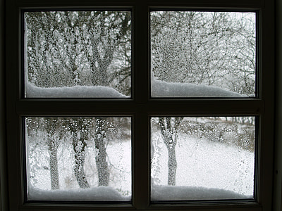 minimalist photography of snow on glass window thumbnail