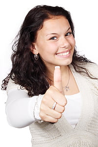 woman in white shirt doing thumbs up hand gesture thumbnail