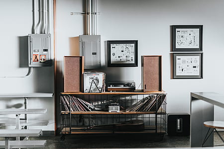 table with vinyl record sleeves and turntable thumbnail