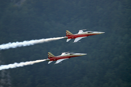 two flying white jetplanes on air thumbnail