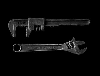 two gray metal wrenches close up photo thumbnail