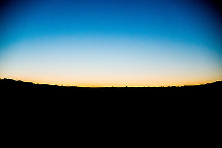 silhouette of land at golden hour thumbnail