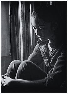 woman in jacket grayscale photo thumbnail