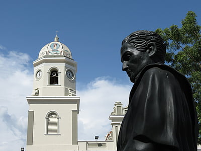 male statue near church thumbnail