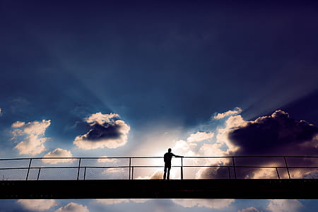 Man In The Middle Of A Bridge thumbnail