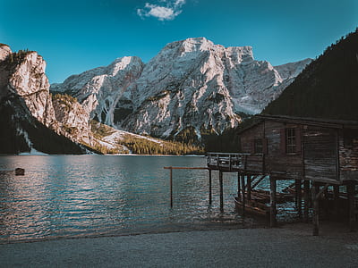 gray shed and white mountain thumbnail