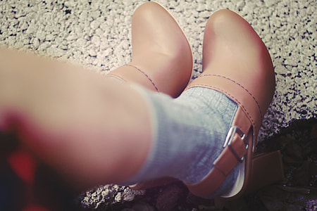 person wearing beige leather sling back pumps thumbnail