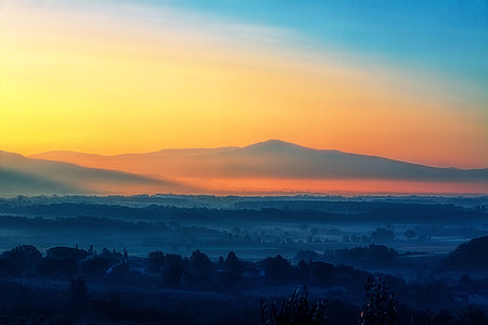 landscape photo of mountains during susnte thumbnail