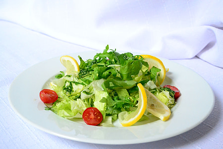 green salad with lemon and cherry tomatoes thumbnail