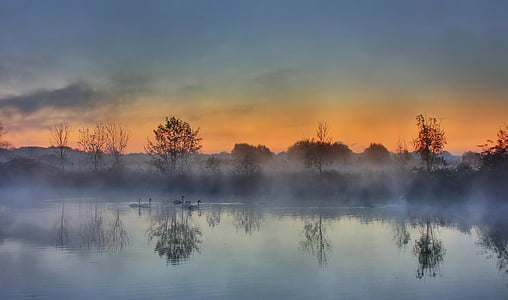 photo of body of water during golden hour thumbnail