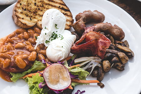 High protein brunch with poached eggs, beans and bacon thumbnail