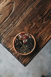 round brown bowl on table thumbnail