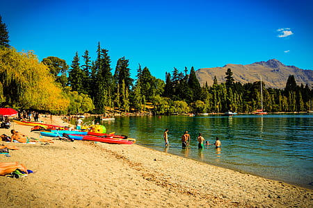 group of people on body of water during daytime thumbnail