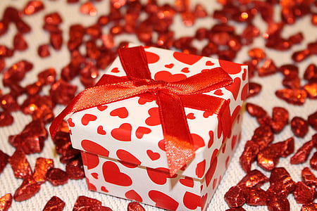 white and red heart print box with bow on white textile thumbnail
