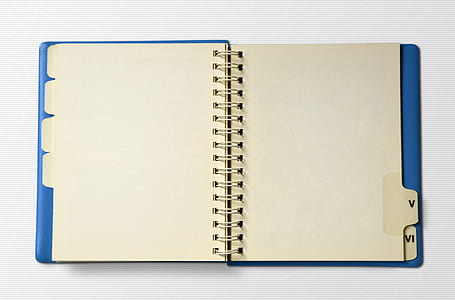 blue and white spiral notebook thumbnail