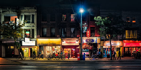 people walking on street at night thumbnail