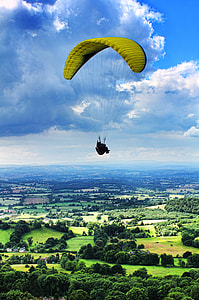 person gliding on air with green parachute thumbnail