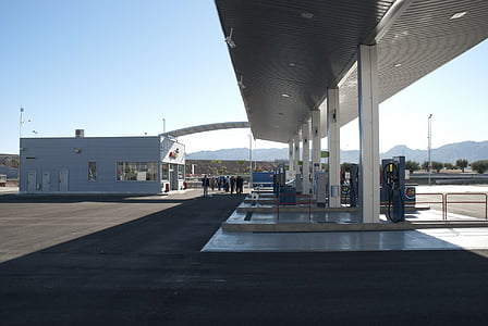 gasoline station under blue sky at daytime thumbnail