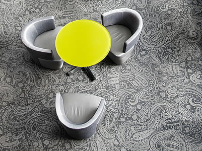 high angle view of table and chairs on carpet thumbnail
