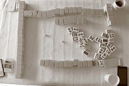 Mahjong pieces on table thumbnail