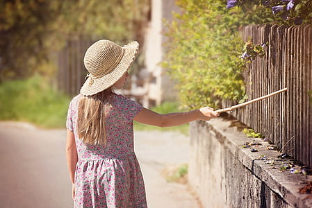 woman wearing brown pandora hat thumbnail