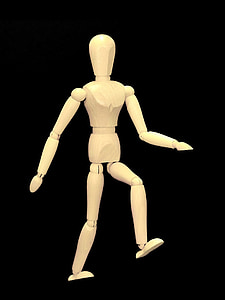brown manikin against black background thumbnail