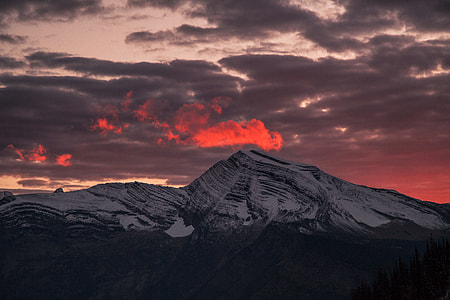 mountains under cloudy sky thumbnail