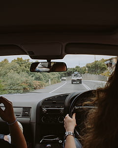 woman driving car thumbnail