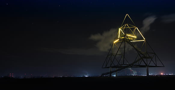 Light Trails in City Against Sky at Night thumbnail